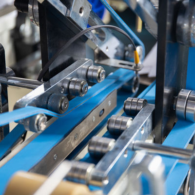 Innovative Automatic Carton Box Folding Gluing Stitching Machine for Aluminum Foil Box